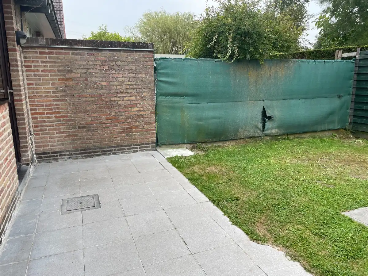 EENGEZINSWONING + garage & tuin foto 11