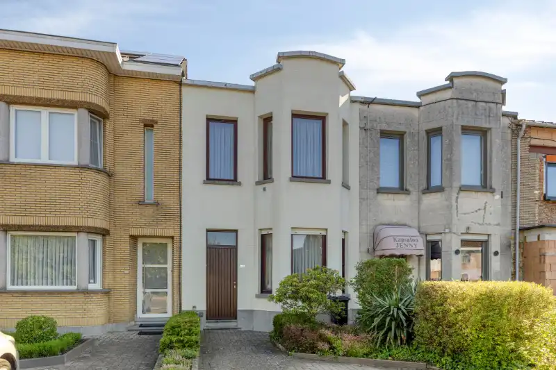 Hoofdfoto van de publicatie: Charmante en goed onderhouden rijwoning nabij het centrum van Mechelen met oprit en tuin.