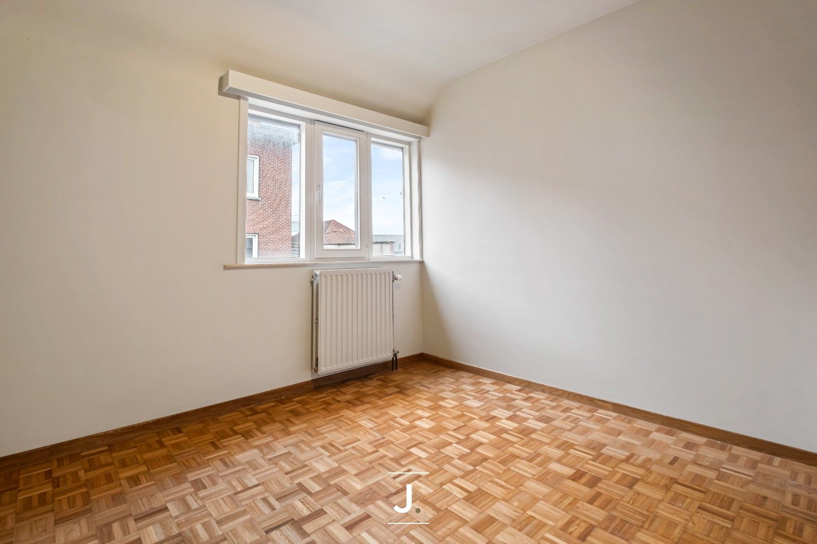 Gezellig en lichtrijk appartement te huur in hartje Kortrijk! foto 9