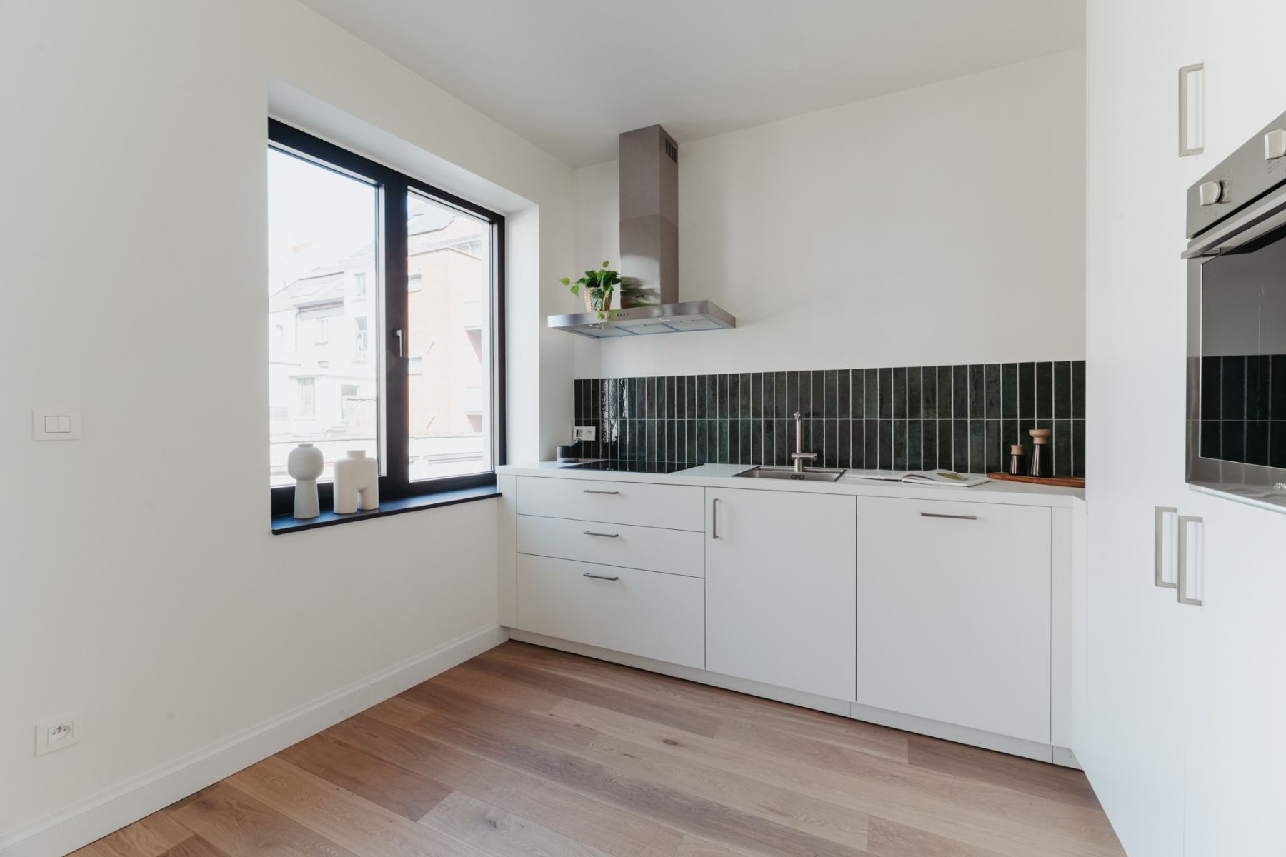 Lichtrijk gerenoveerd 2 slaapkamerappartement vlakbij Gent centrum foto 8