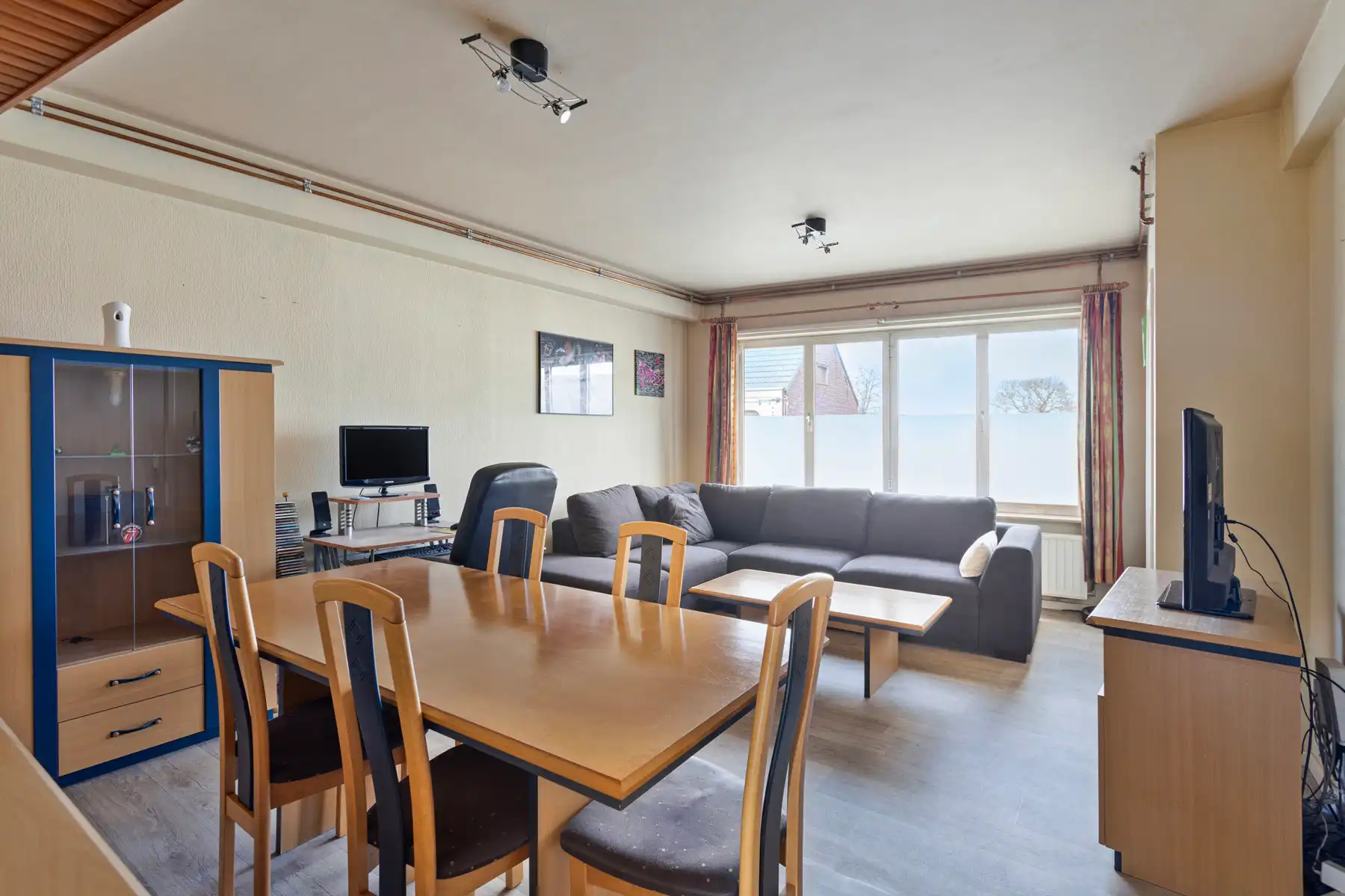 Solide eigendom: commerciële ruimte met atelier + 2 appart. foto 2