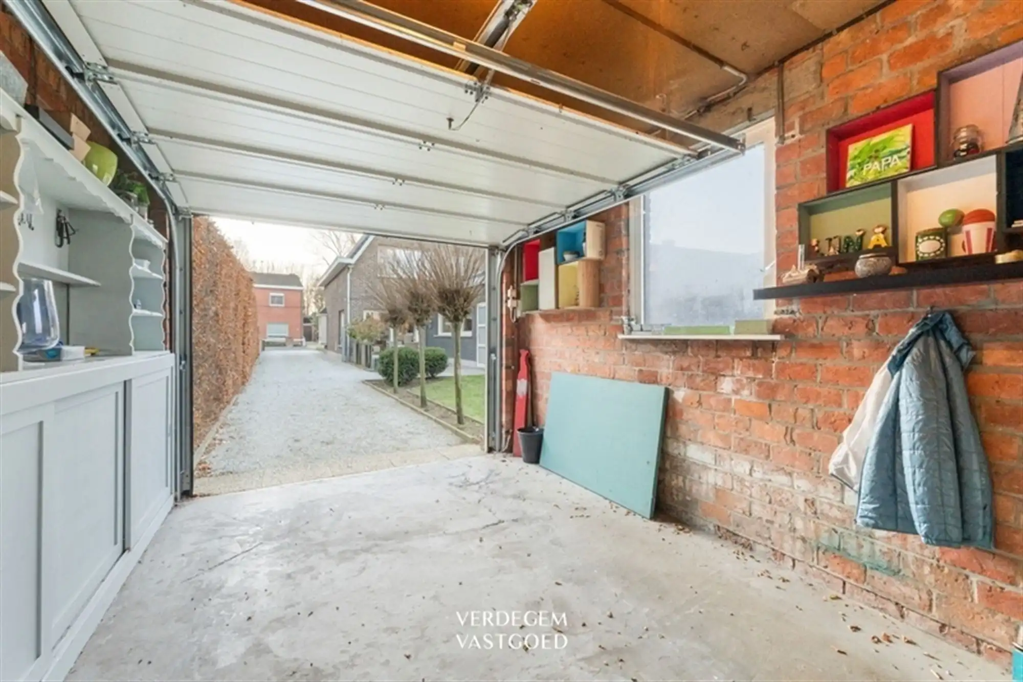 Stijlvolle en instapklare woning met 2+1 slaapkamers, garage en mooie tuin foto 16