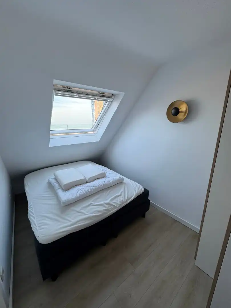 Luxe duplex appartement met terras en frontaal zeezicht foto 12