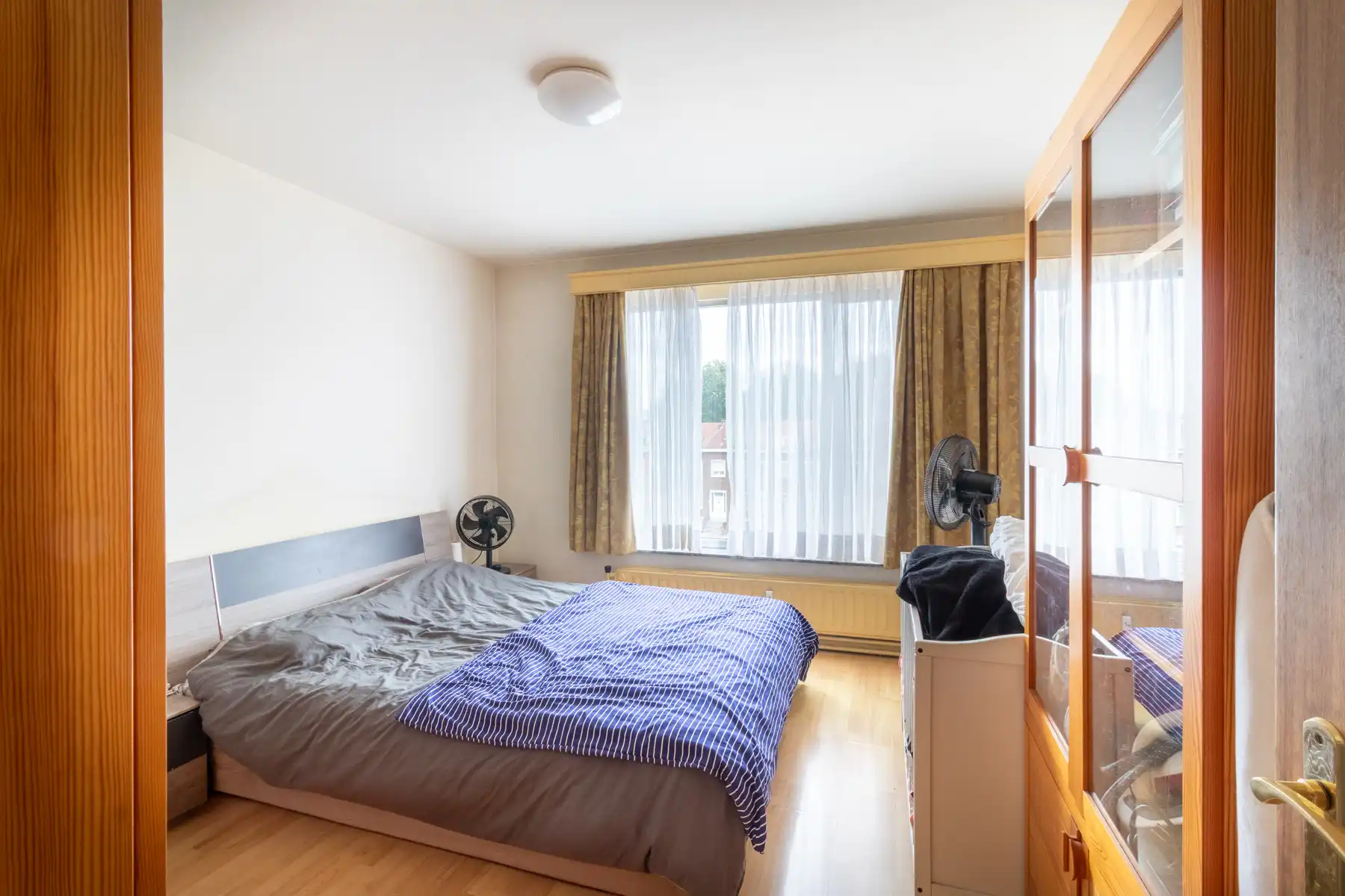 Ruim appartement met berging, terrasje en kelder foto 7