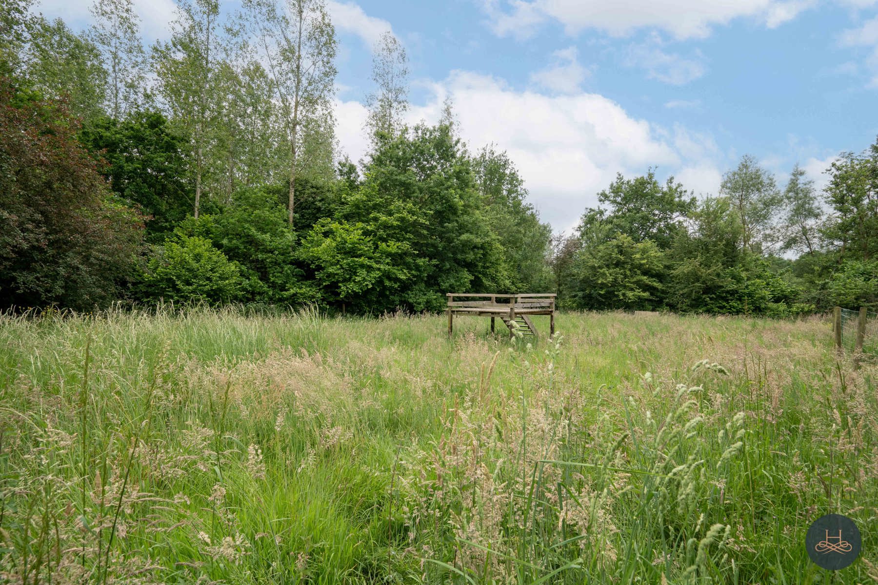 Achterliggende gezinswoning op rustgevend perceel foto 22