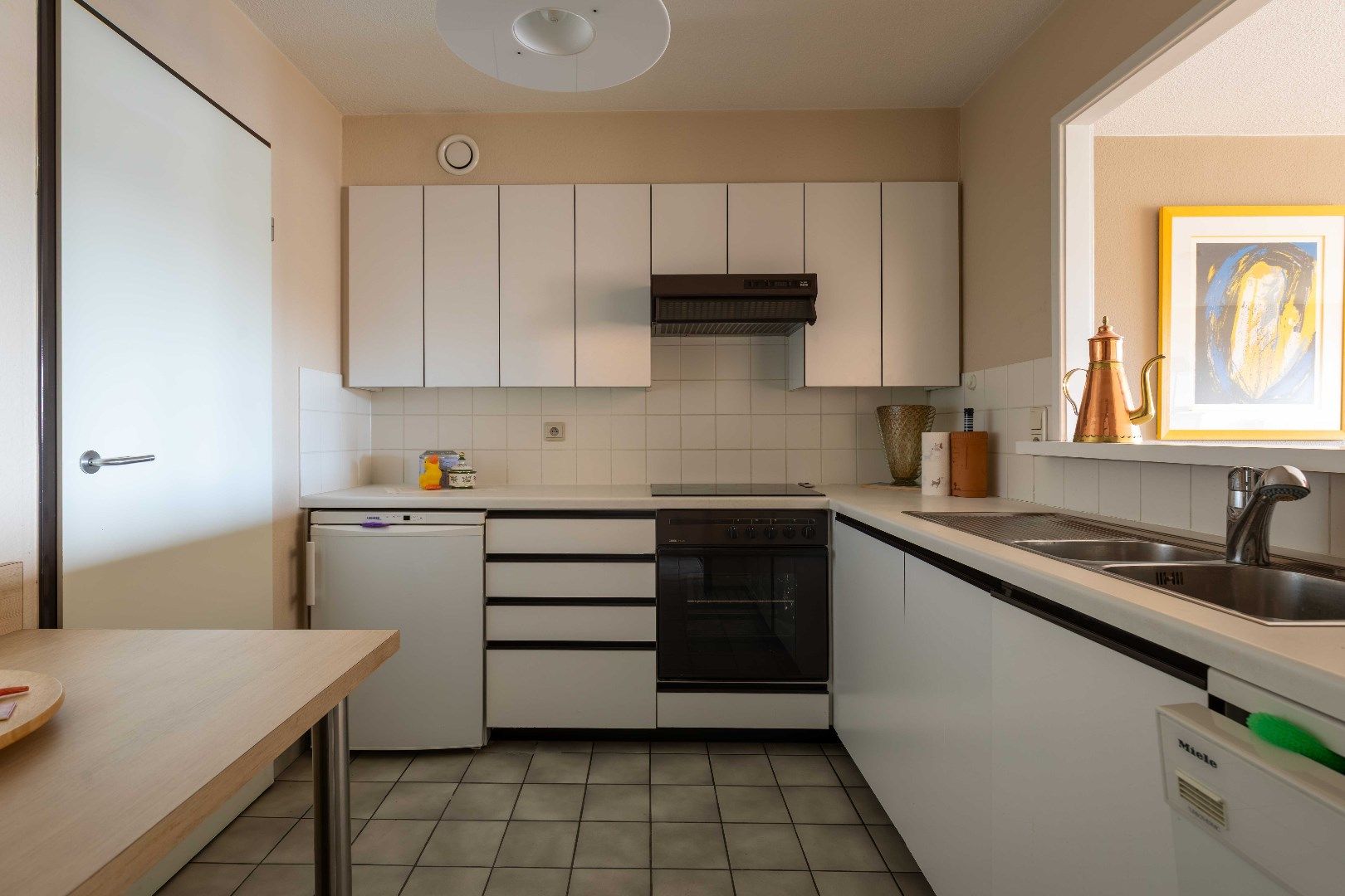Ruim appartement met zonneterras, twee slaapkamers en gemeenschappelijke tuin in de aller beste buurt: Kristus-Koning! foto 6