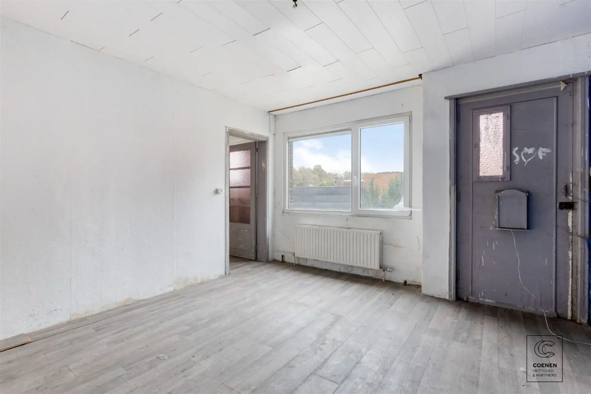 Te renoveren app. met handelsruimte op een gunstige locatie! foto 8