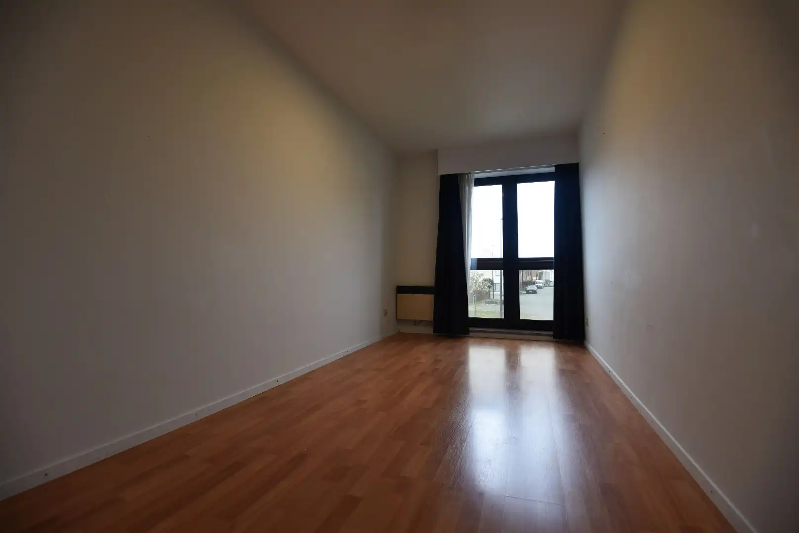 Ruim appartement met 2 slpks en ondergrondse autostaanplaats foto 7