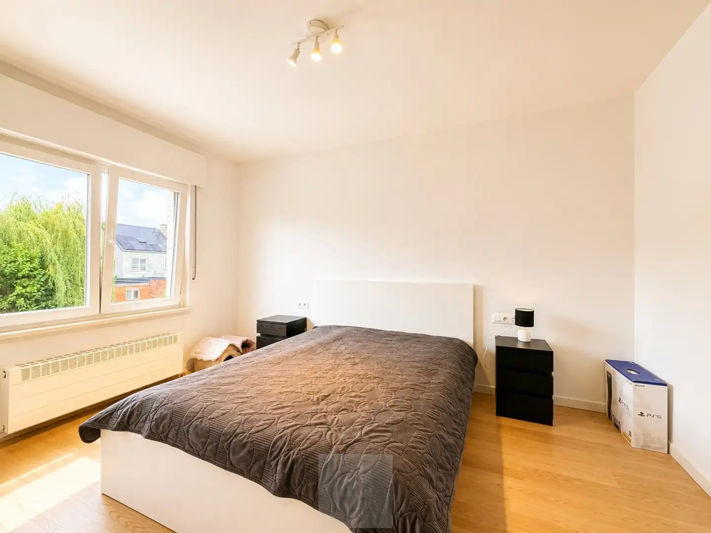 Gerenoveerd 2-slaapkamerappartement met garagebox in Wondelgem foto 7