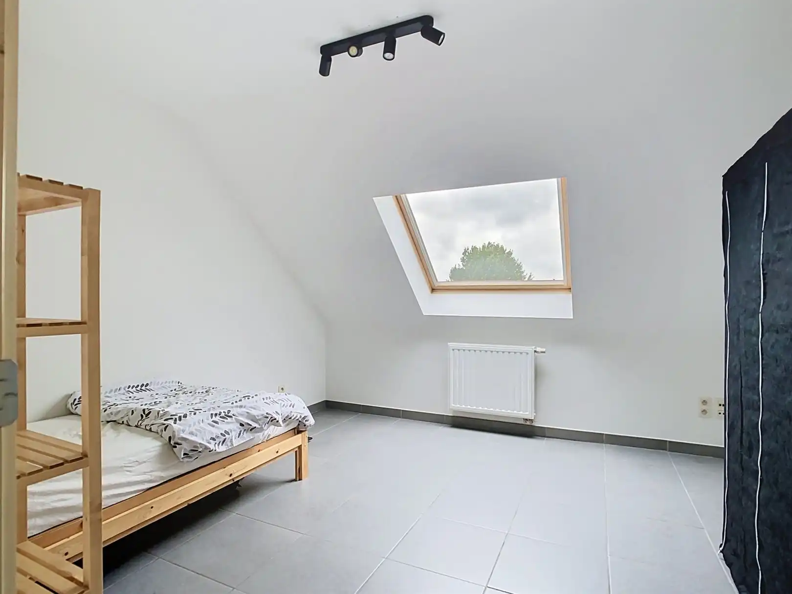 Ruim appartement met tuin en staanplaats foto 4