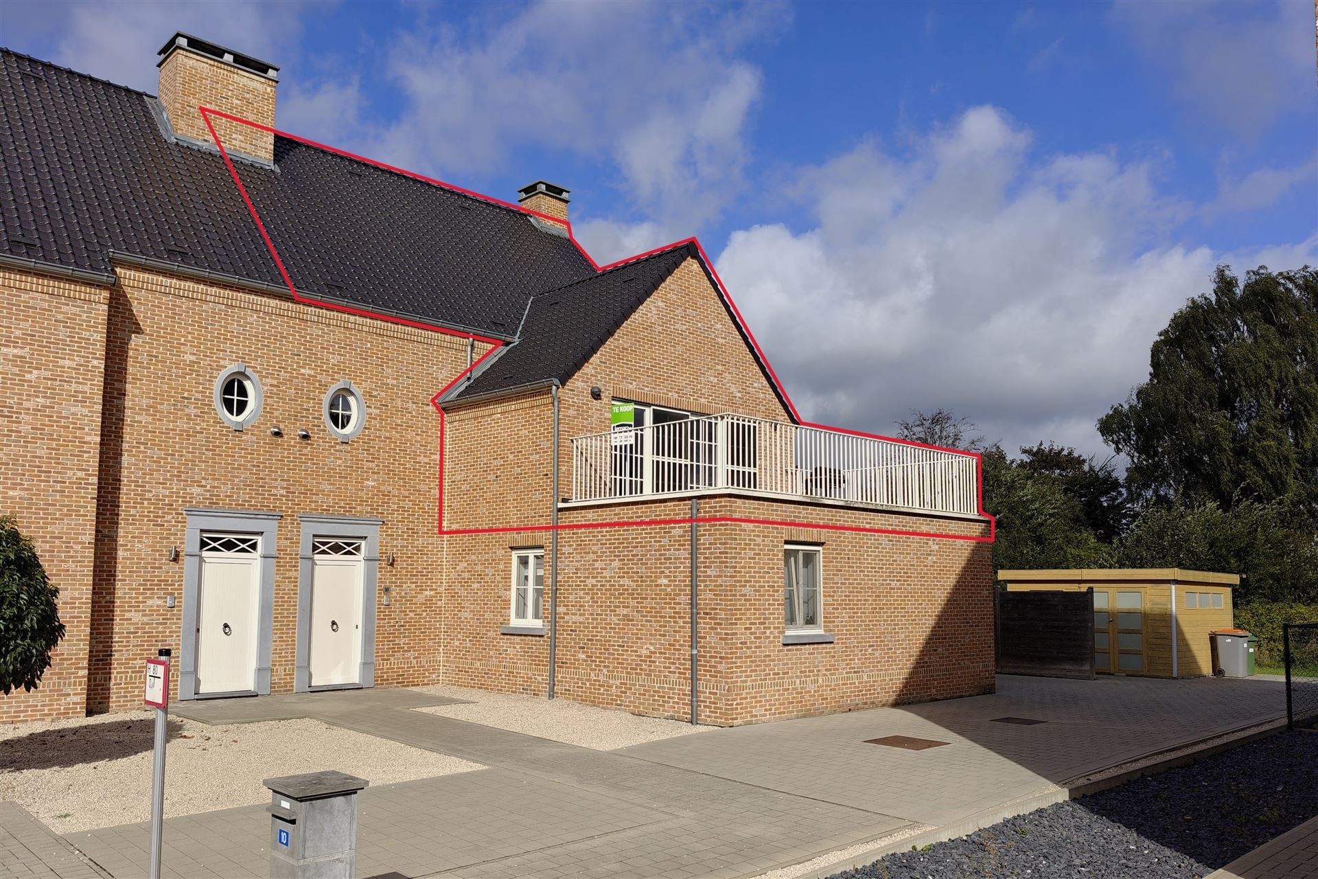 Ruime duplex (197m²) in een residentiële woonwijk te Munsterbilzen foto {{pictureIndex}}