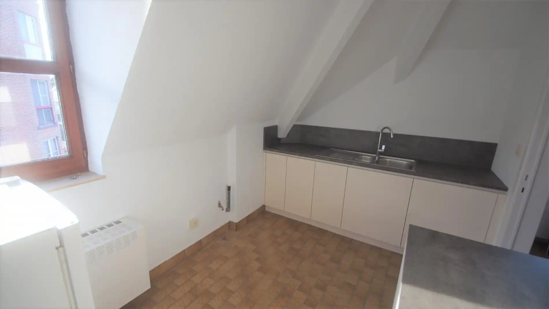 Zeer goed gelegen dakappartement met 2 ruime slpks foto 5