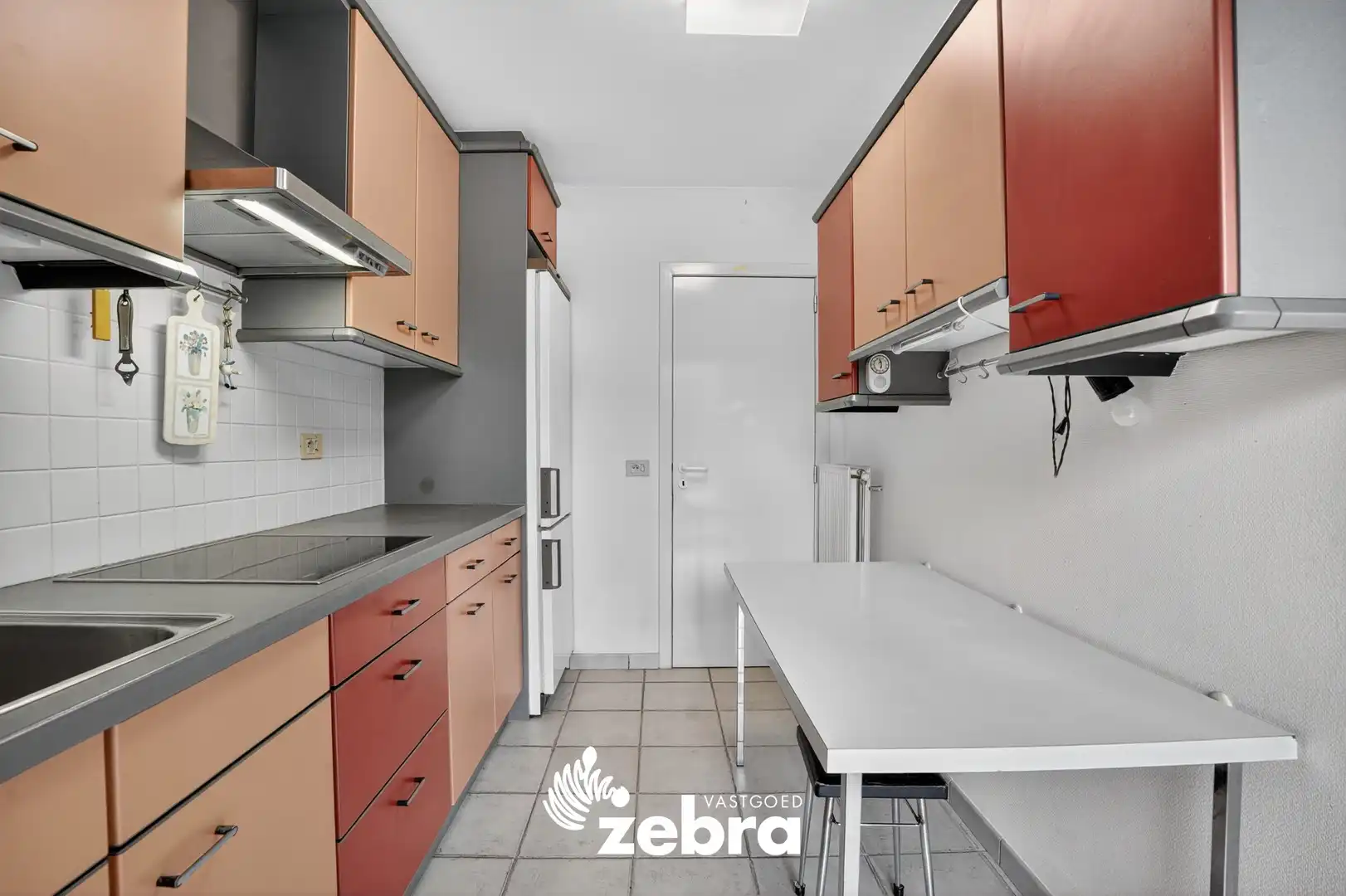 Gelijkvloers appartement met zuidoost gerichte tuin te Roeselare! foto 10