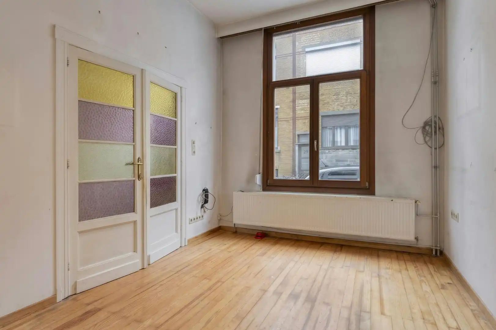 Op te frissen huis met 4 slaapkamers te koop in Borgerhout! foto 6