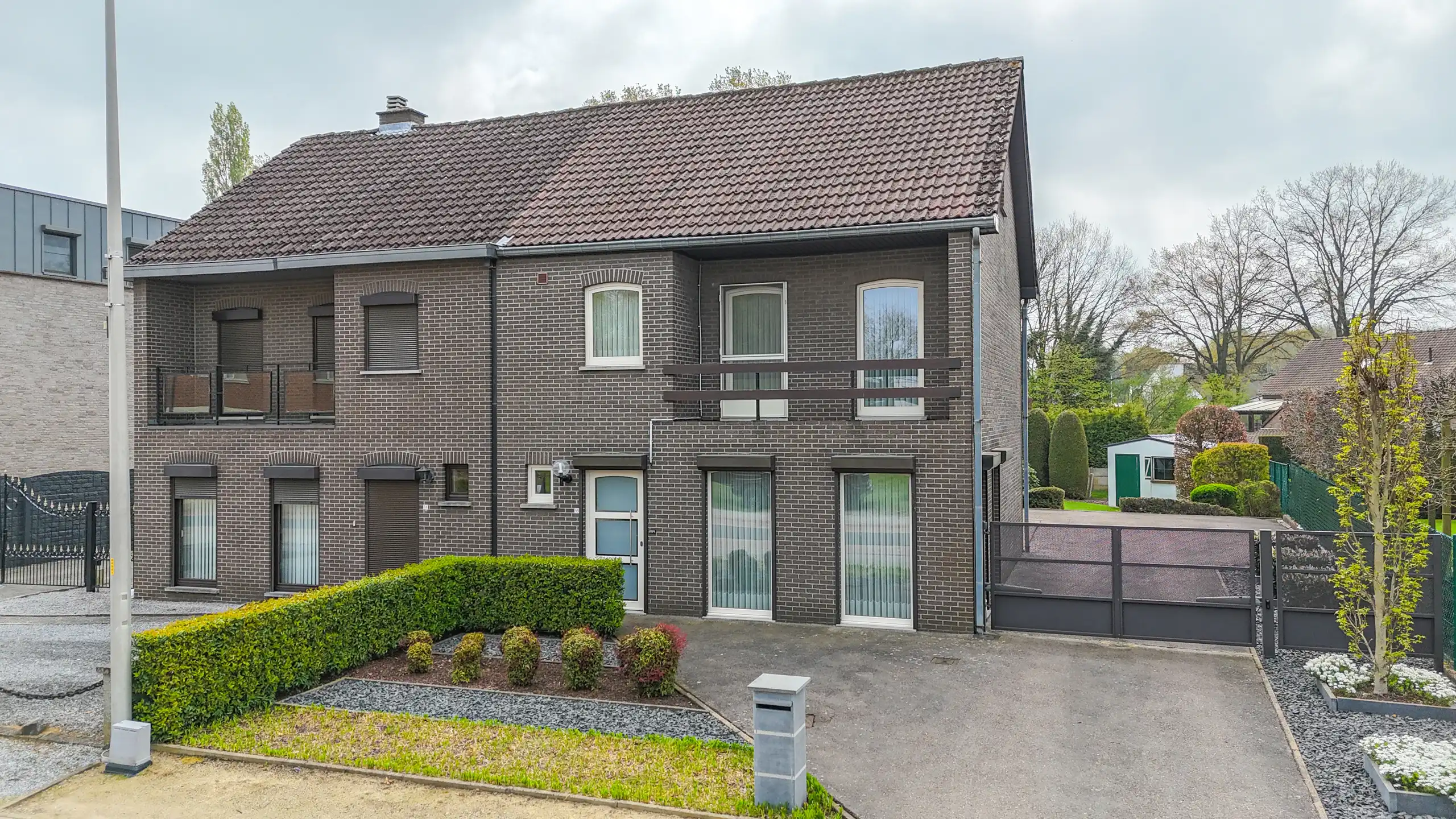 Charmante halfopen woning in rustige woonwijk te Eversel! foto {{pictureIndex}}