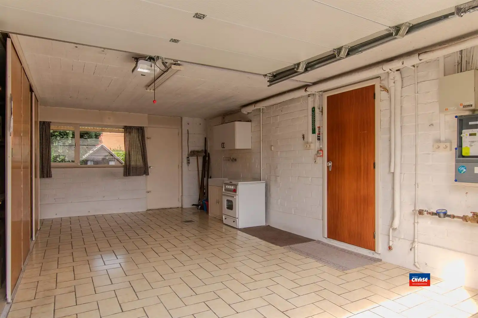 Deels te renoveren bel-étage met 3 slpks, garage + tuin foto 3