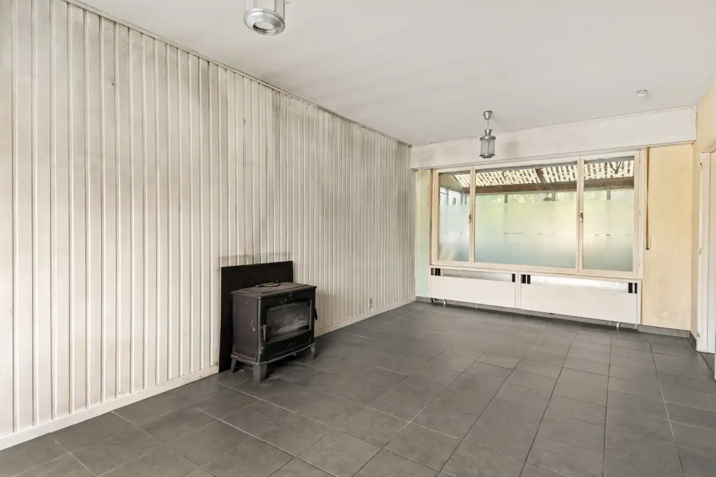 Te renoveren woning met 3 slpk., garage en tuin foto 4