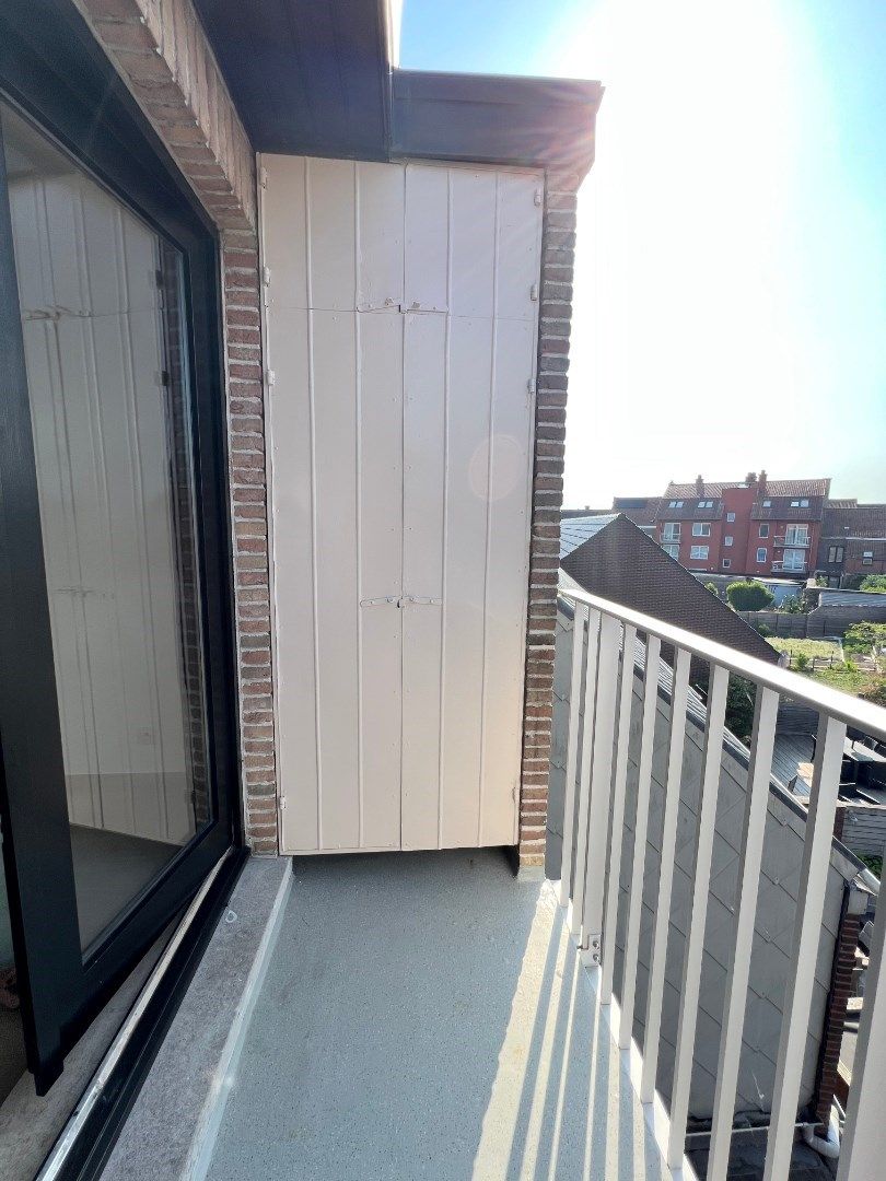 APPARTEMENT MET 2 SLAAPKAMERS, TERRAS EN GARAGEBOX VLAKBIJ CENTRUM foto 10