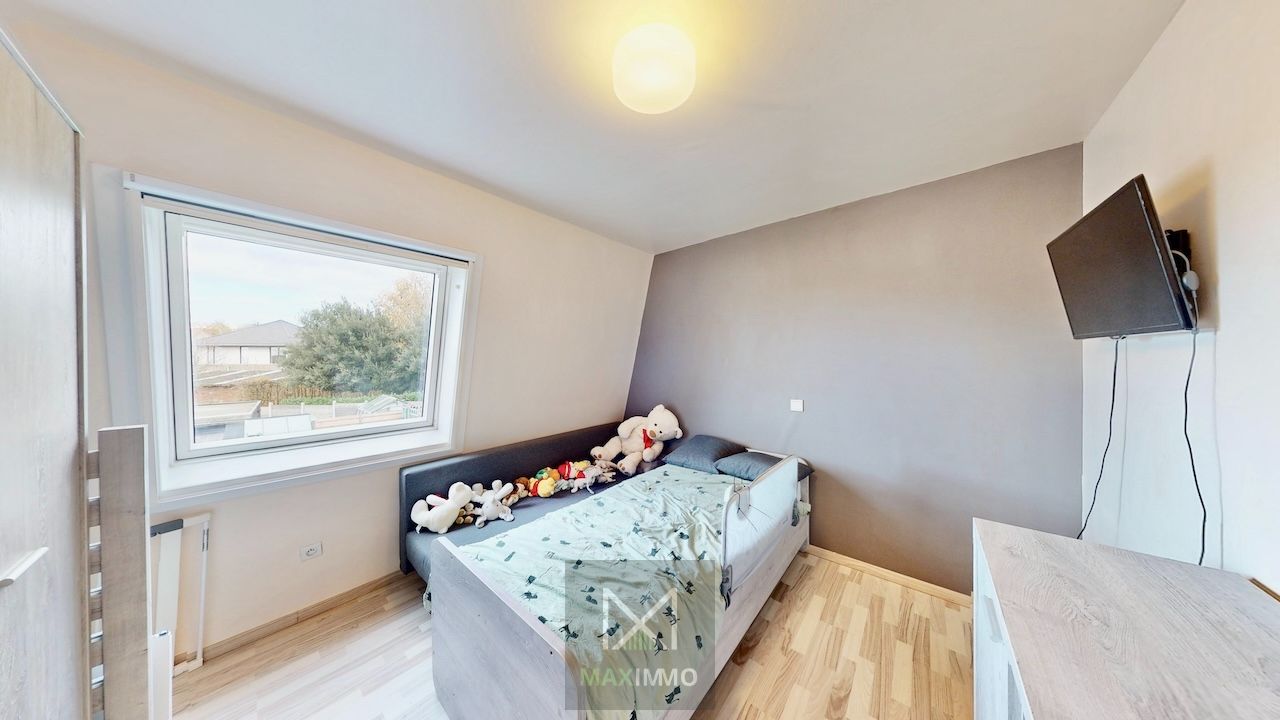 Instapklare gezinswoning met tuin en grote garage in Aalbeke foto 9