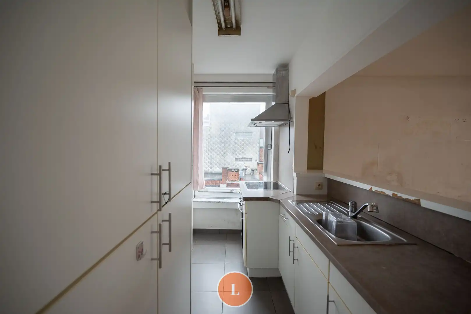 Op te frissen appartement te Kortrijk met 3 slaapkamers. foto 7