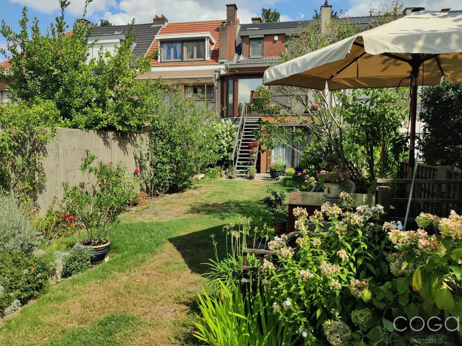 Woning met 4 slaapkamers, garage en tuin foto 29