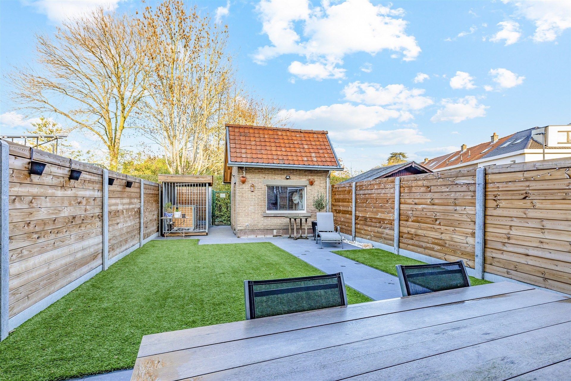 Instapklare woning met 2 slks, tuin en achteruitweg foto 18