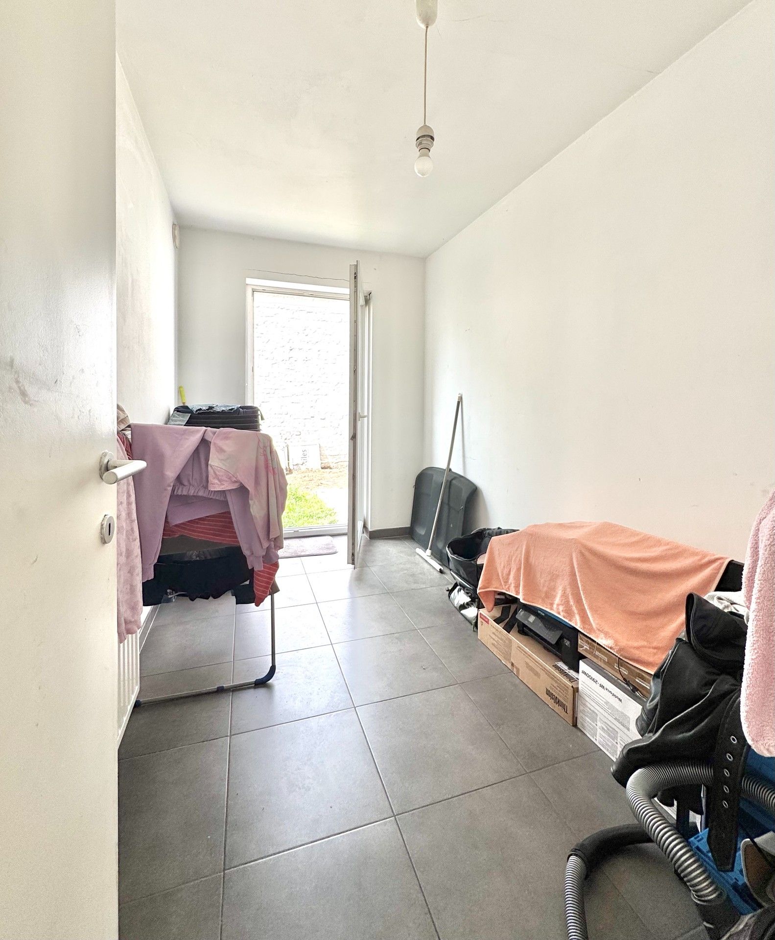 GELIJKVLOERS APPARTEMENT MET 2 SLPKS EN TUIN foto 6
