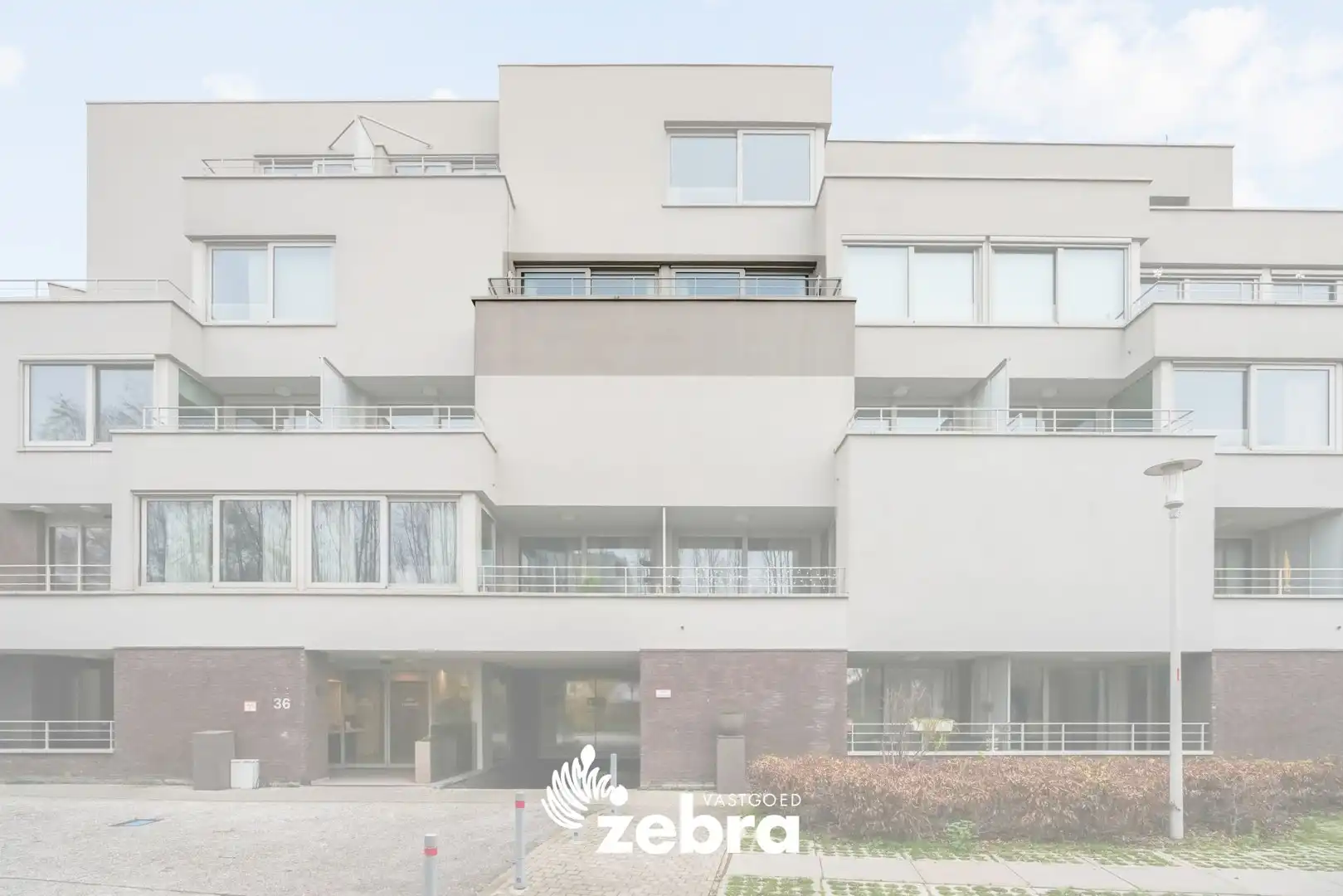 Moderne serviceflat met prachtig zicht op de Leie en autostaanplaats te Deinze! foto 26