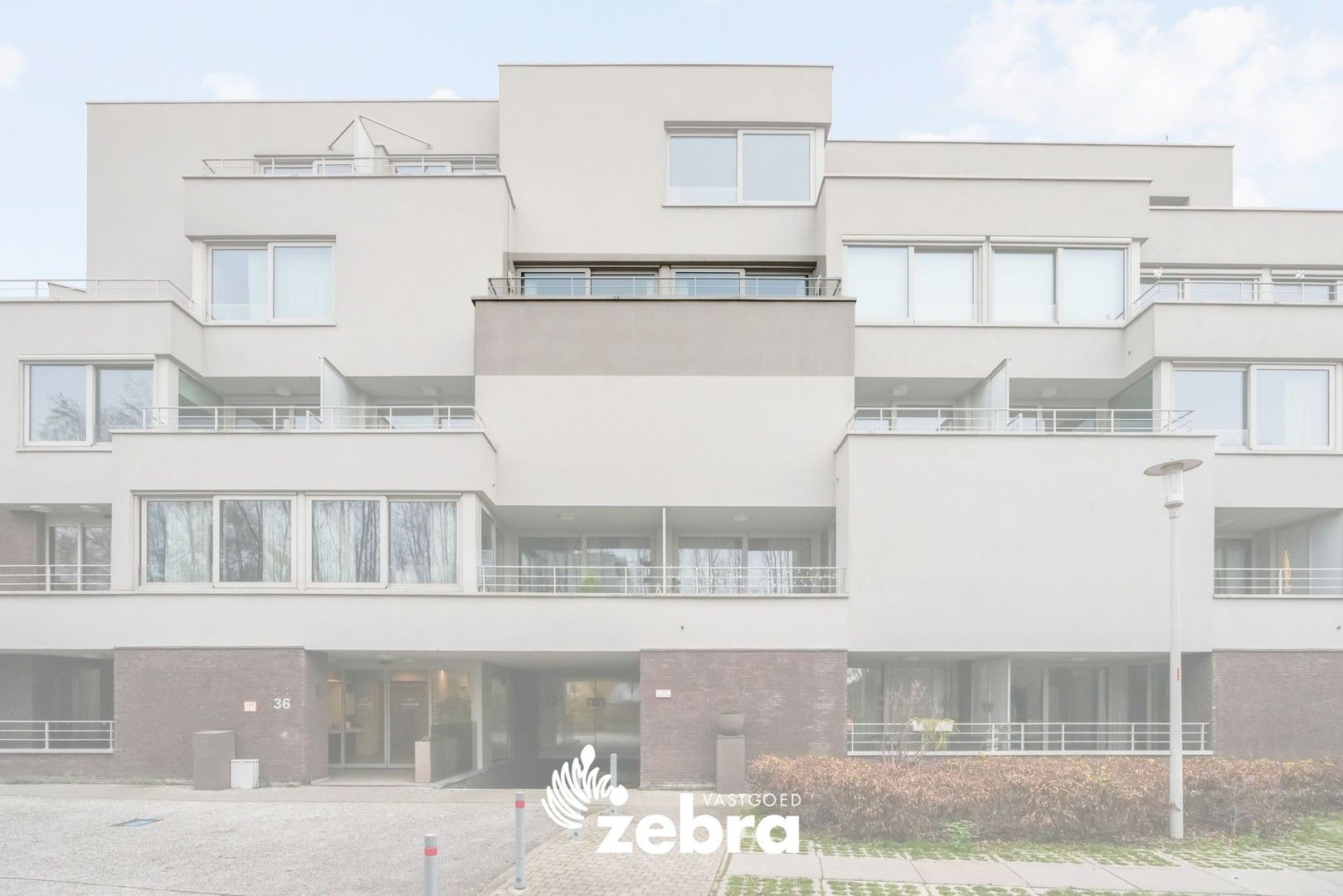 Moderne serviceflat met prachtig zicht op de Leie en autostaanplaats te Deinze! foto 26