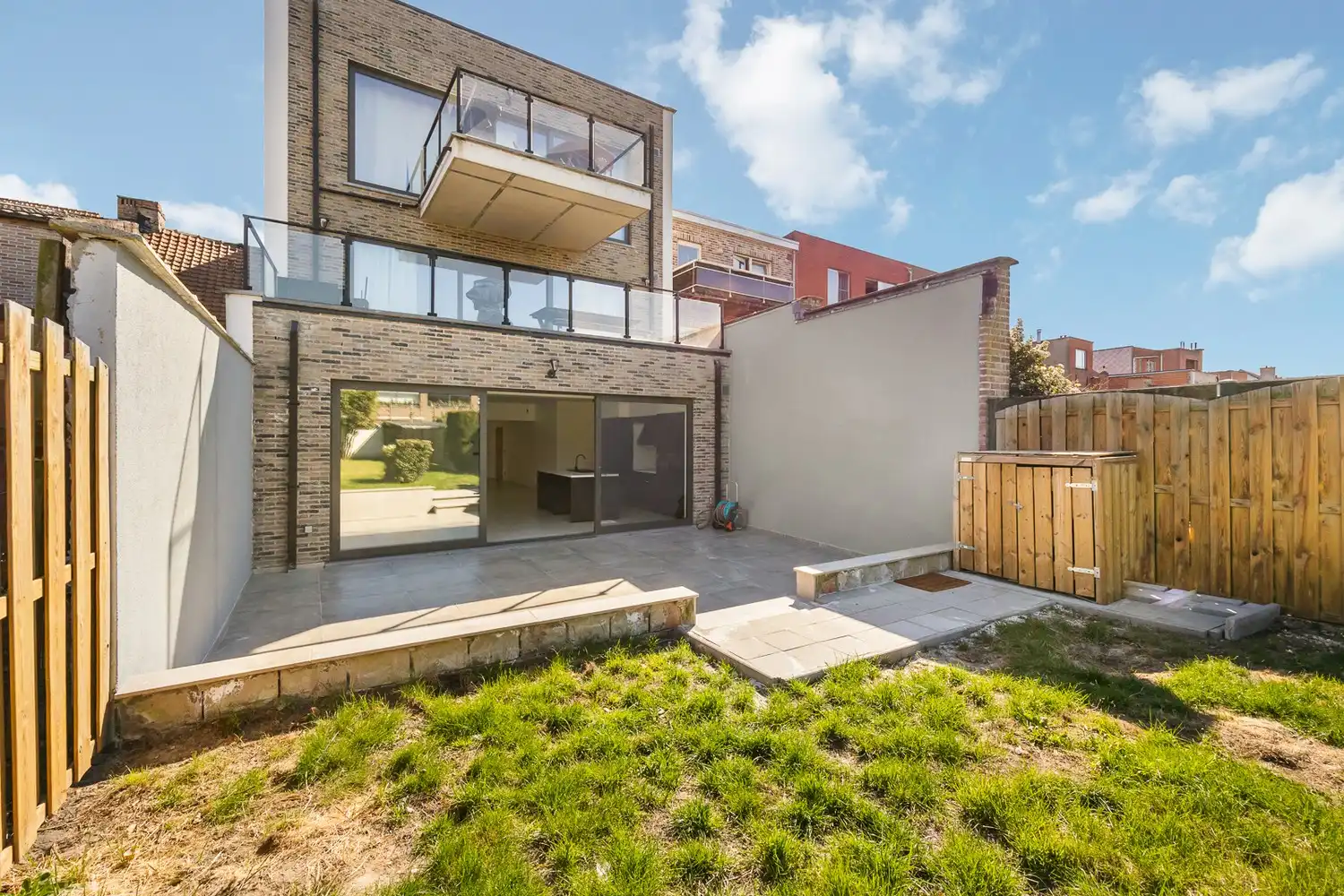 Modern gelijkvloers appartement met een zeer grote tuin (±200m²)  in hartje Sint-Niklaas! foto 12