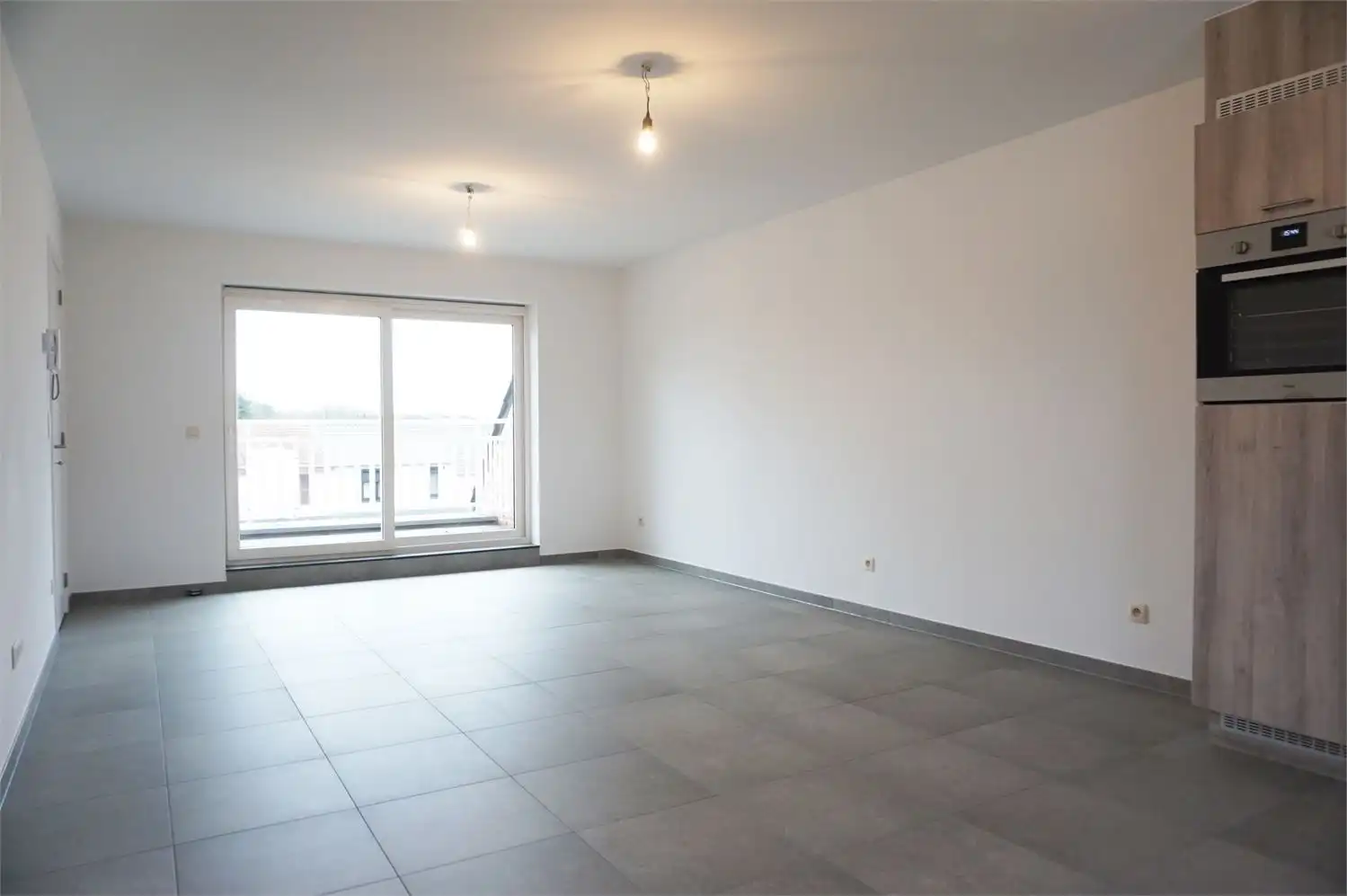 Duplex appartement met terras, 2 slaapkamers en dubbele autostaanplaats in centrum Paal foto 2