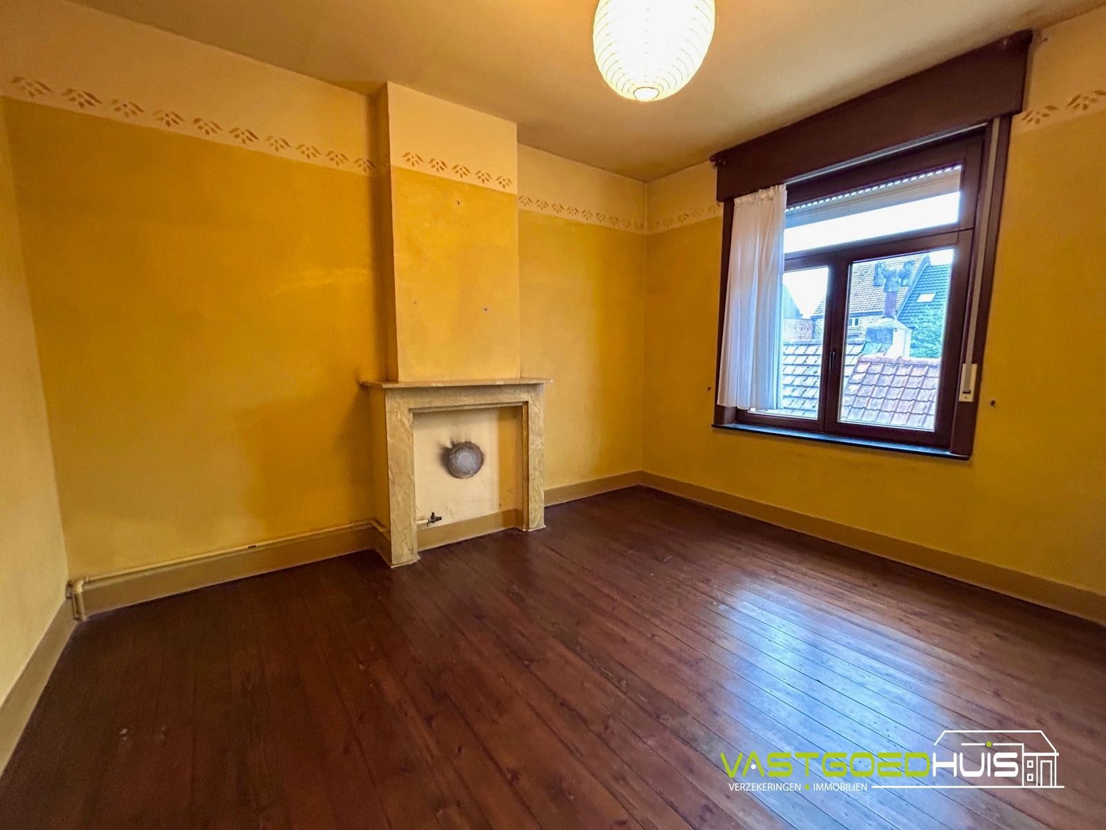 Karaktervolle gezinswoning met authentieke details in Ninove foto 25