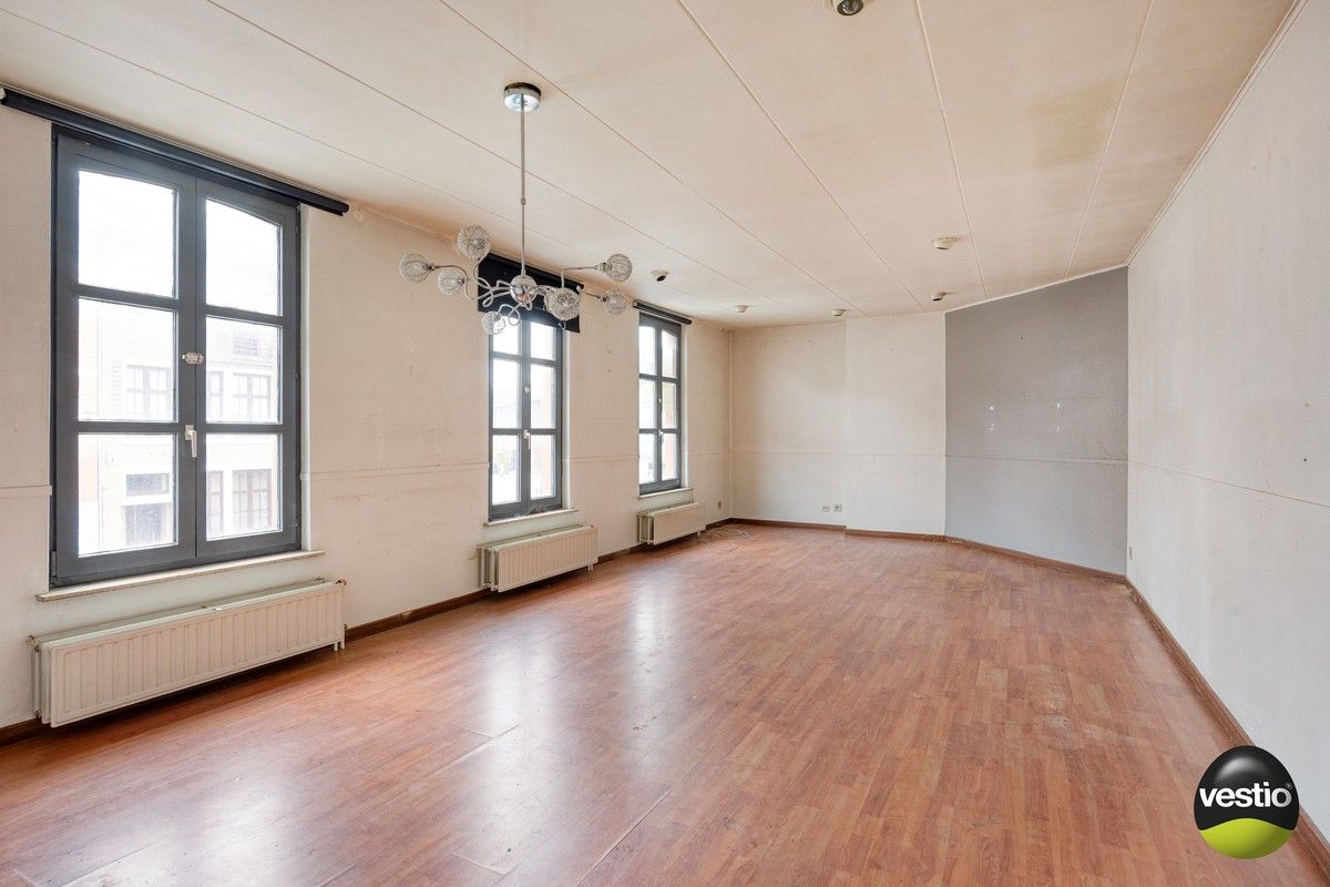 Handelspand met woonst / projectopportuniteit aan de Luikersteenweg. foto 11