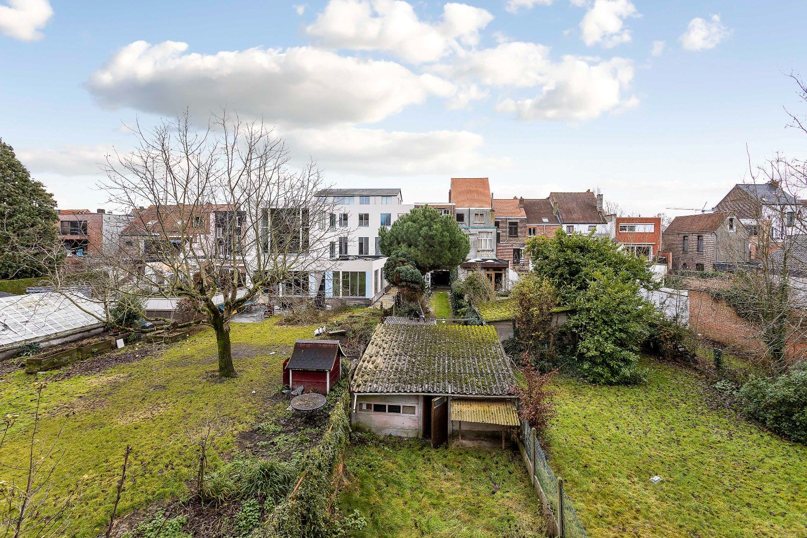 Te renoveren opbrengsteigendom met twee appartementen, parkings en tuin foto 27