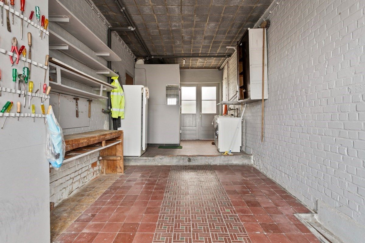 Ruime woning met 4 slaapkamers en garage! foto 11