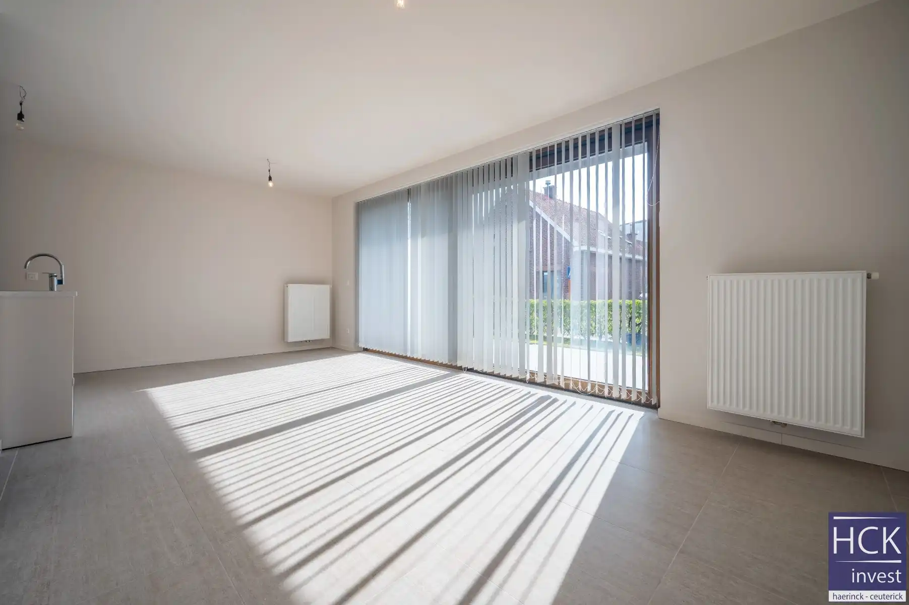 KRUISHOUTEM - Lichtrijk & ruim gelijkvloersapp. + terras op de Marolle foto 2