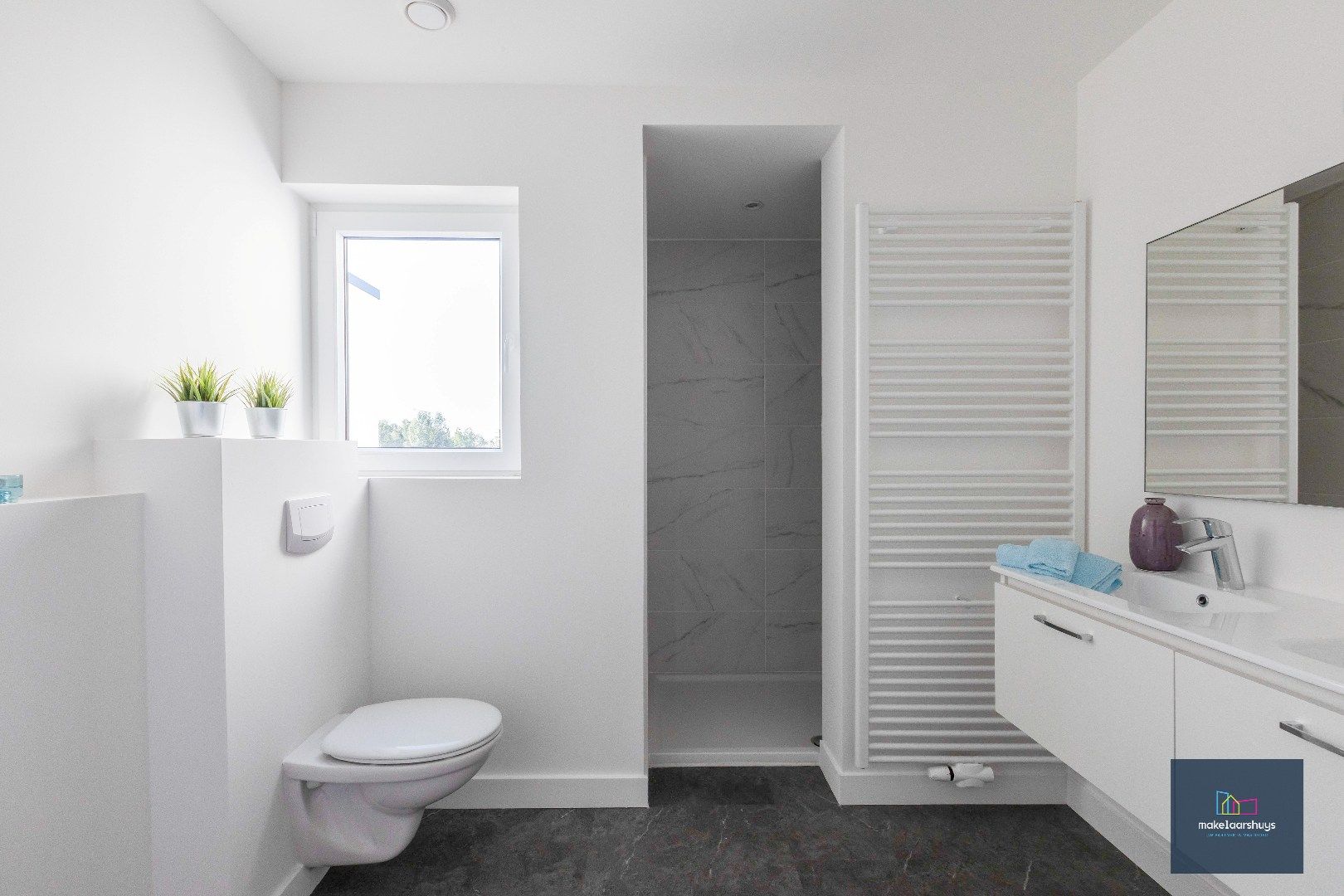 Instapklare energiezuinige woning met 3slpk tuin en staanplaats foto 13