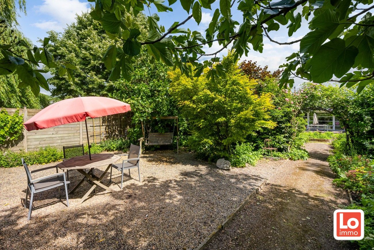 VERKOCHT! Charmante open woning met carport en héél grote aangename tuin gelegen op een toplocatie vlakbij het centrum van Zaffelare! foto 37