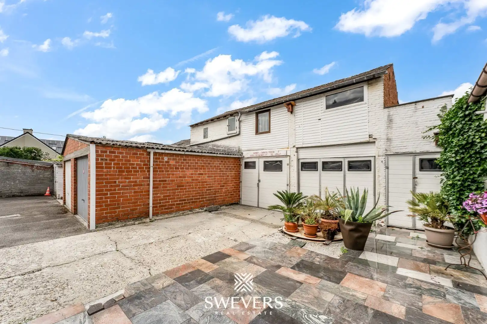 Woonst met 5 slaapkamers en hangar van 250m² in centrum Beringen foto 36