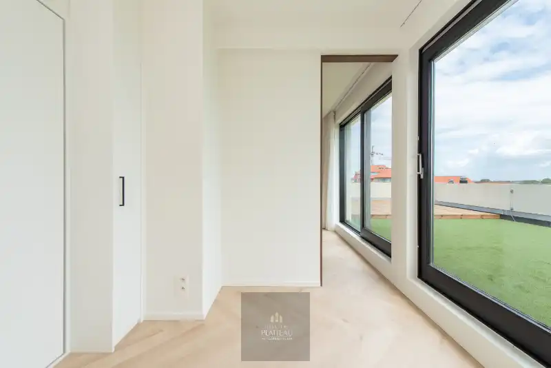 Vernieuwd dakappartement met zeer groot dakterras. foto 21