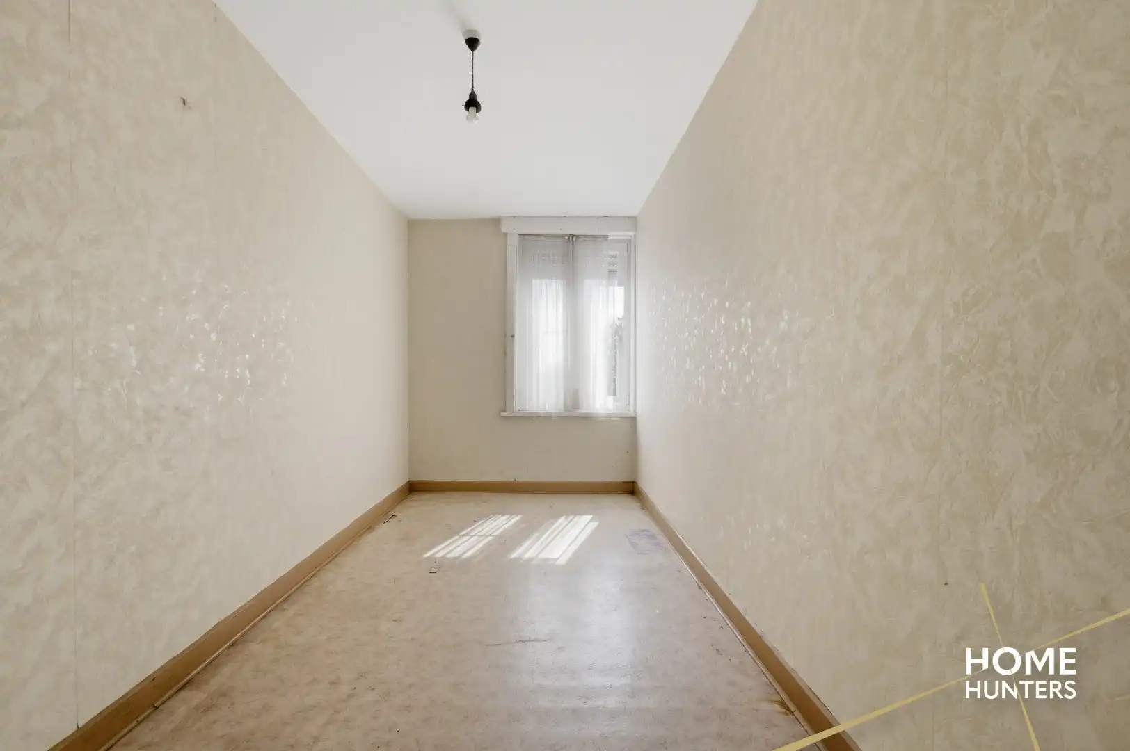 Veelzijdige eigendom met te renoveren woning en twee ruime loodsen in Langemark foto 11