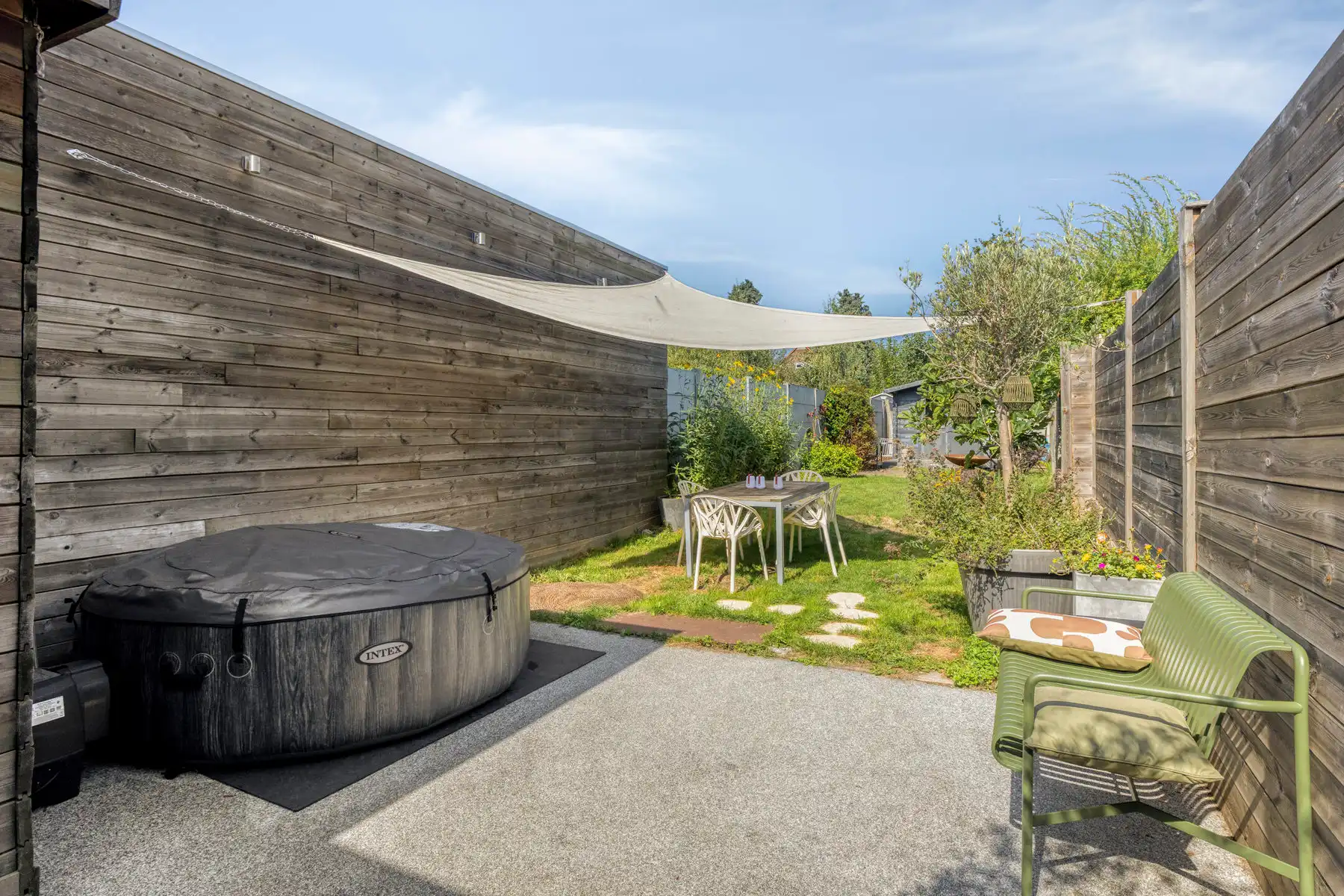 Instapklare woning met gezellige tuin en terras in het centrum van Opwijk! foto 25