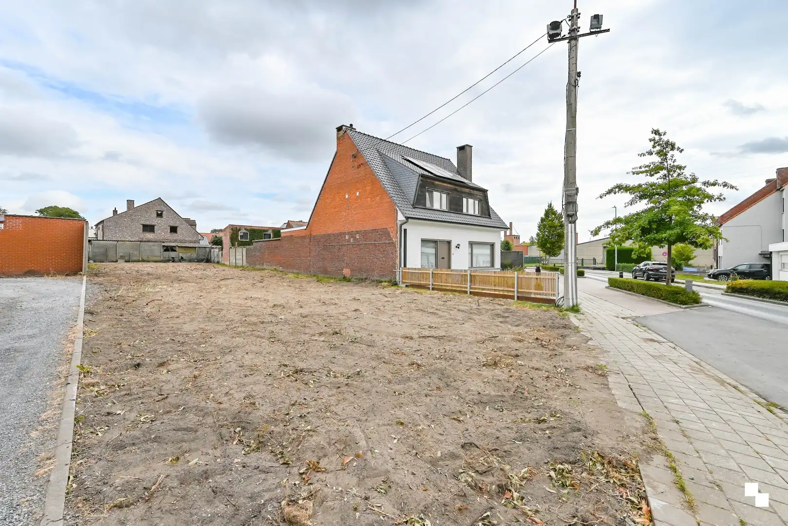 Bouwgrond zonder bouwverplichting van 551 m² voor halfopen bebouwing te Emelgem foto 2