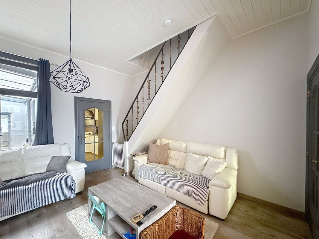 Investerings -of starterswoning met uitweg achteraan. foto 3