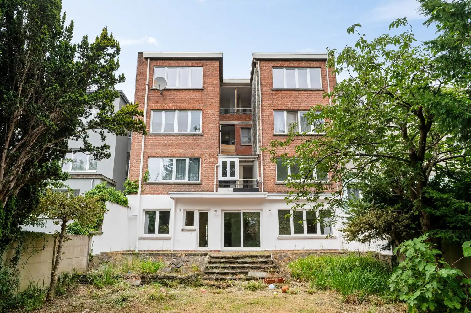 Ruim gelijkvloers appartement met 3 slaapkamers, tuin en garage! foto 14