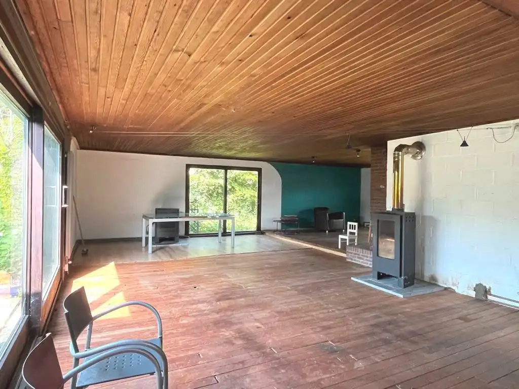 Volledig te verbouwen/slopen woning (bouwgrond) met 3 slaapkamers, inpandige garage, tuin en garagebox op een perceel van 1.154m² foto 7