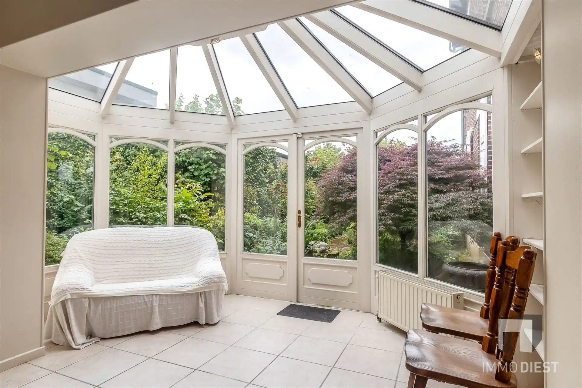 Elegante woning met vele mogelijkheden, gezellige tuin en dubbele garage foto 26