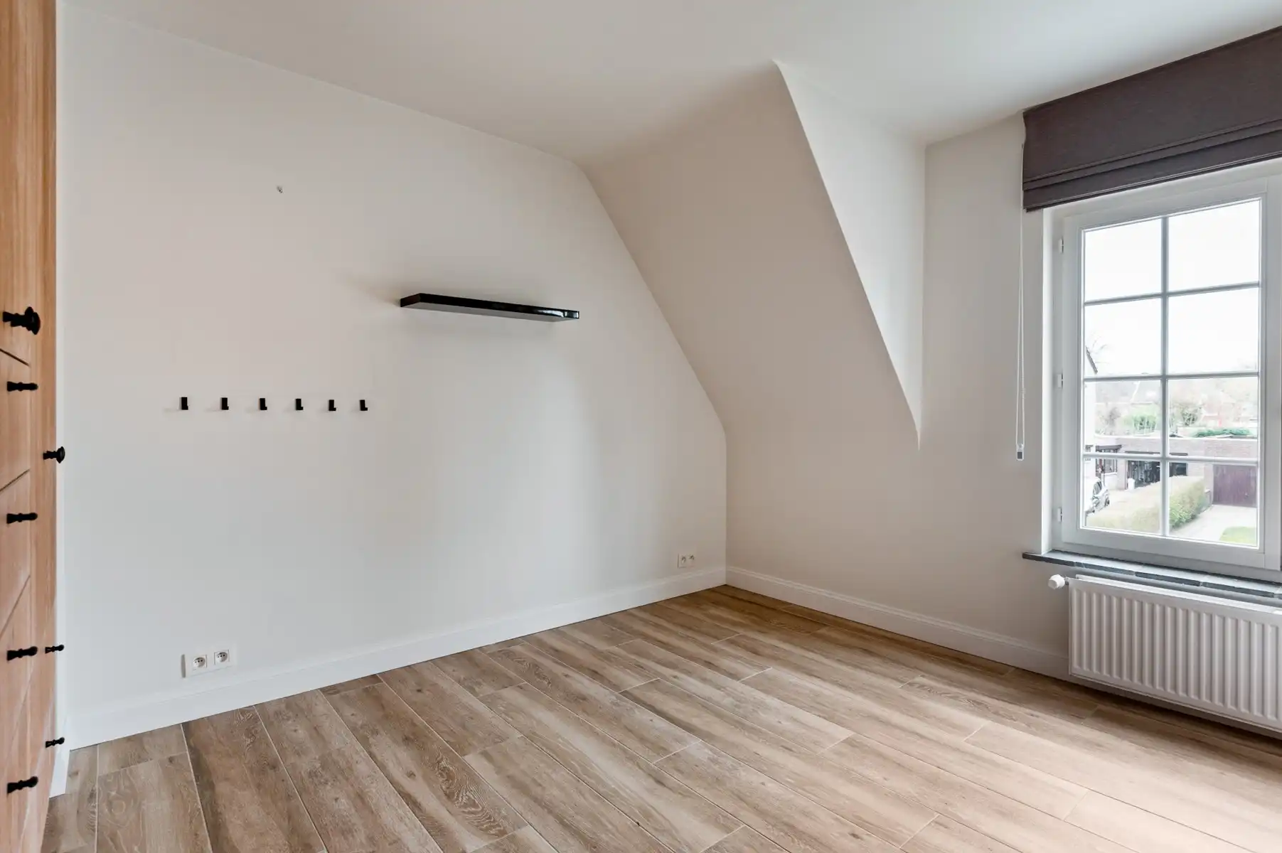 Instapklare woning met 2 slaapkamers, bureau en westgerichte tuin foto 16