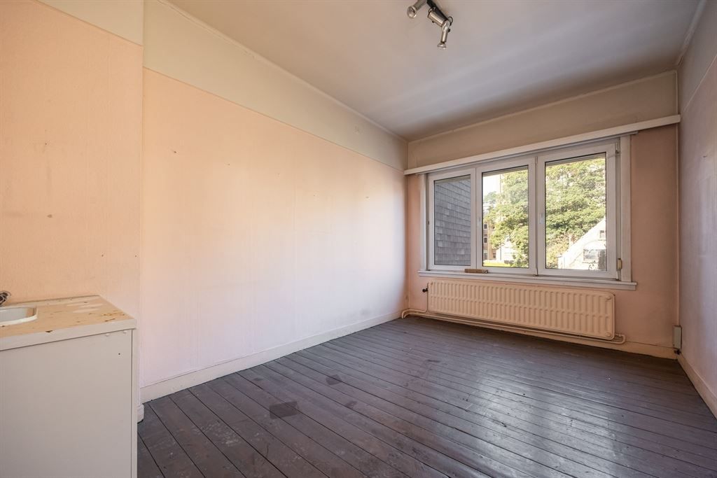 Woning met gigantisch magazijn te renoveren foto 13