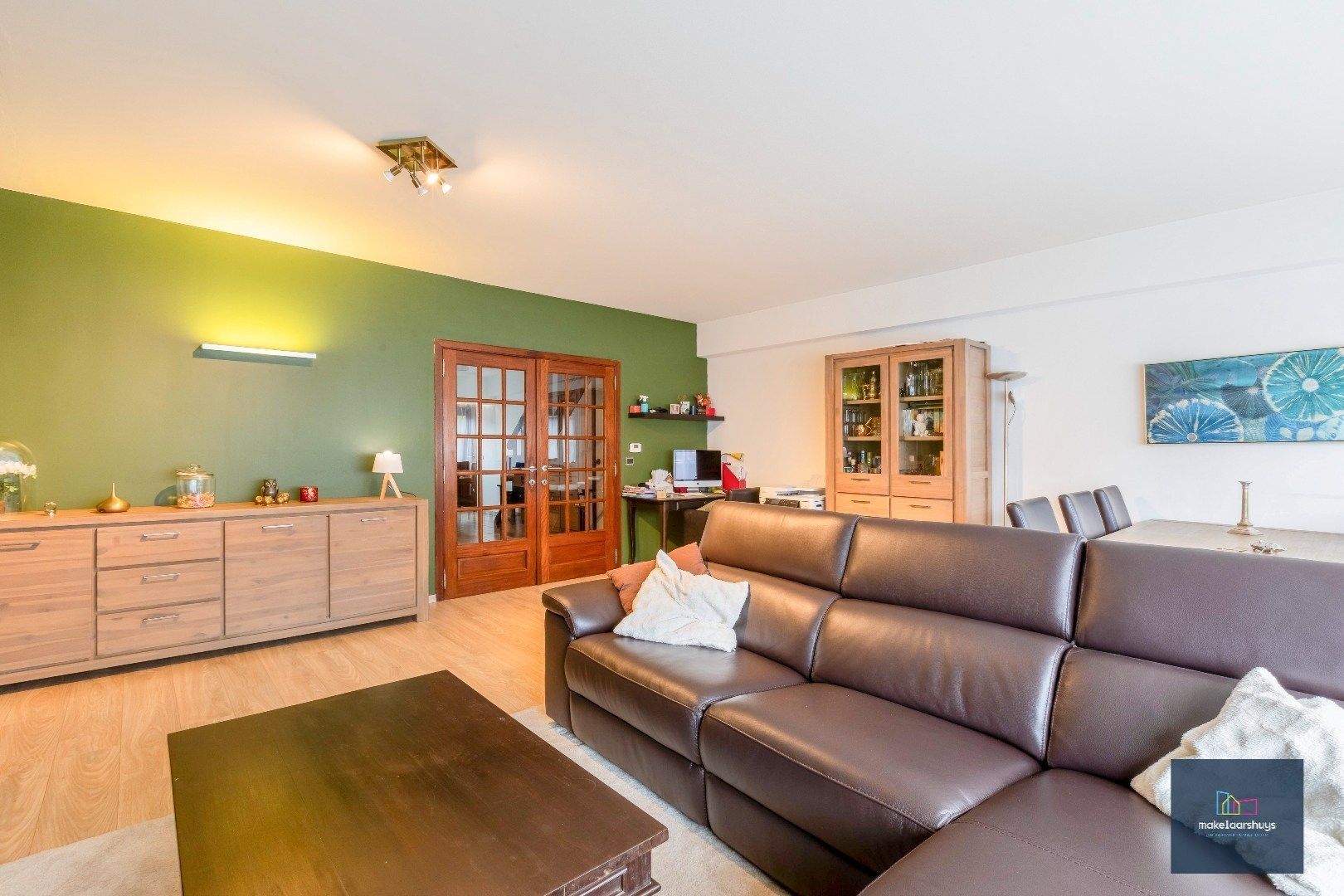 Heel ruime Instapklare woning in rij  met zonneterras en 2 staanplaatsen foto 6